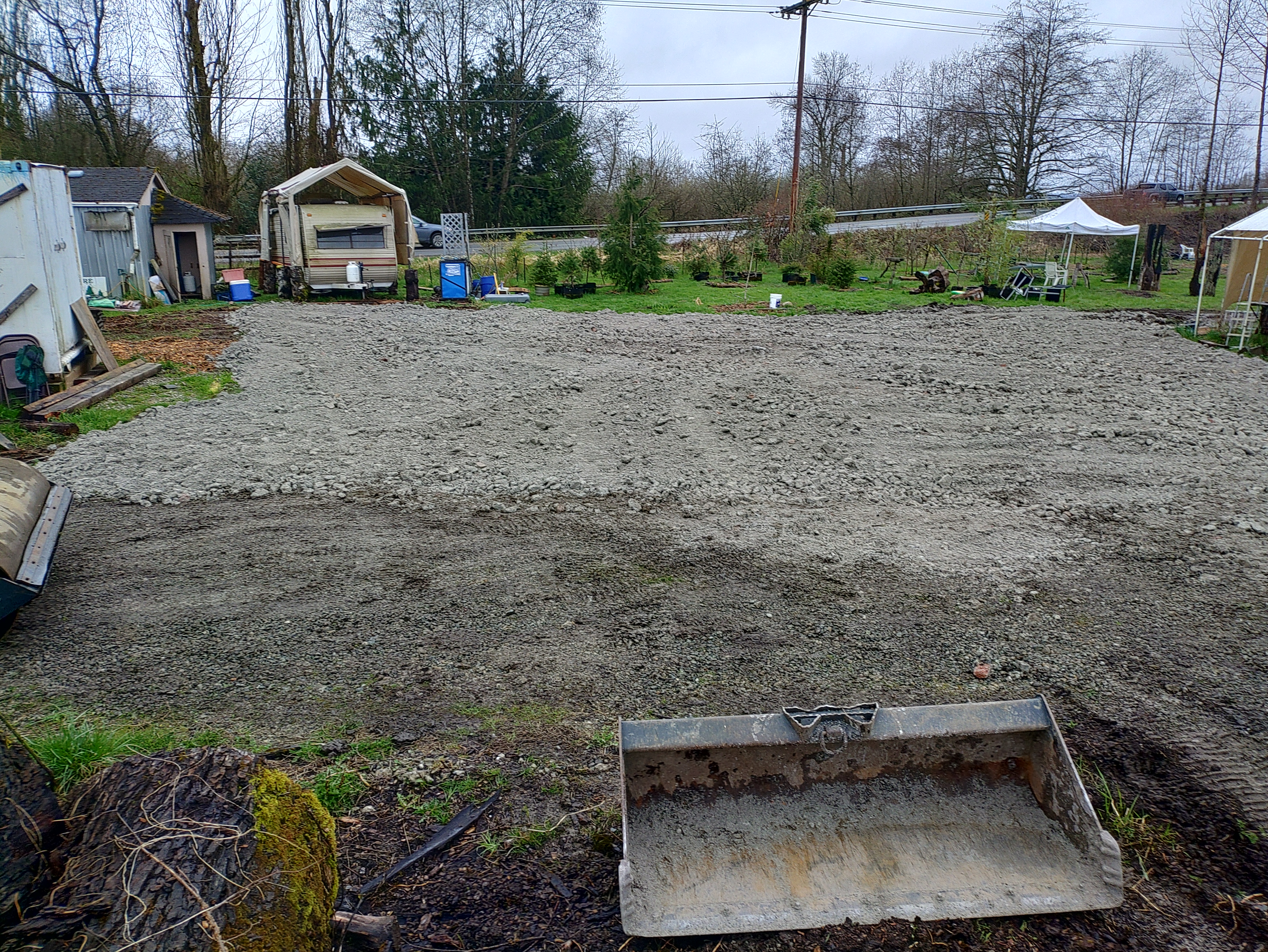 Large pipe in ground on a construction site.